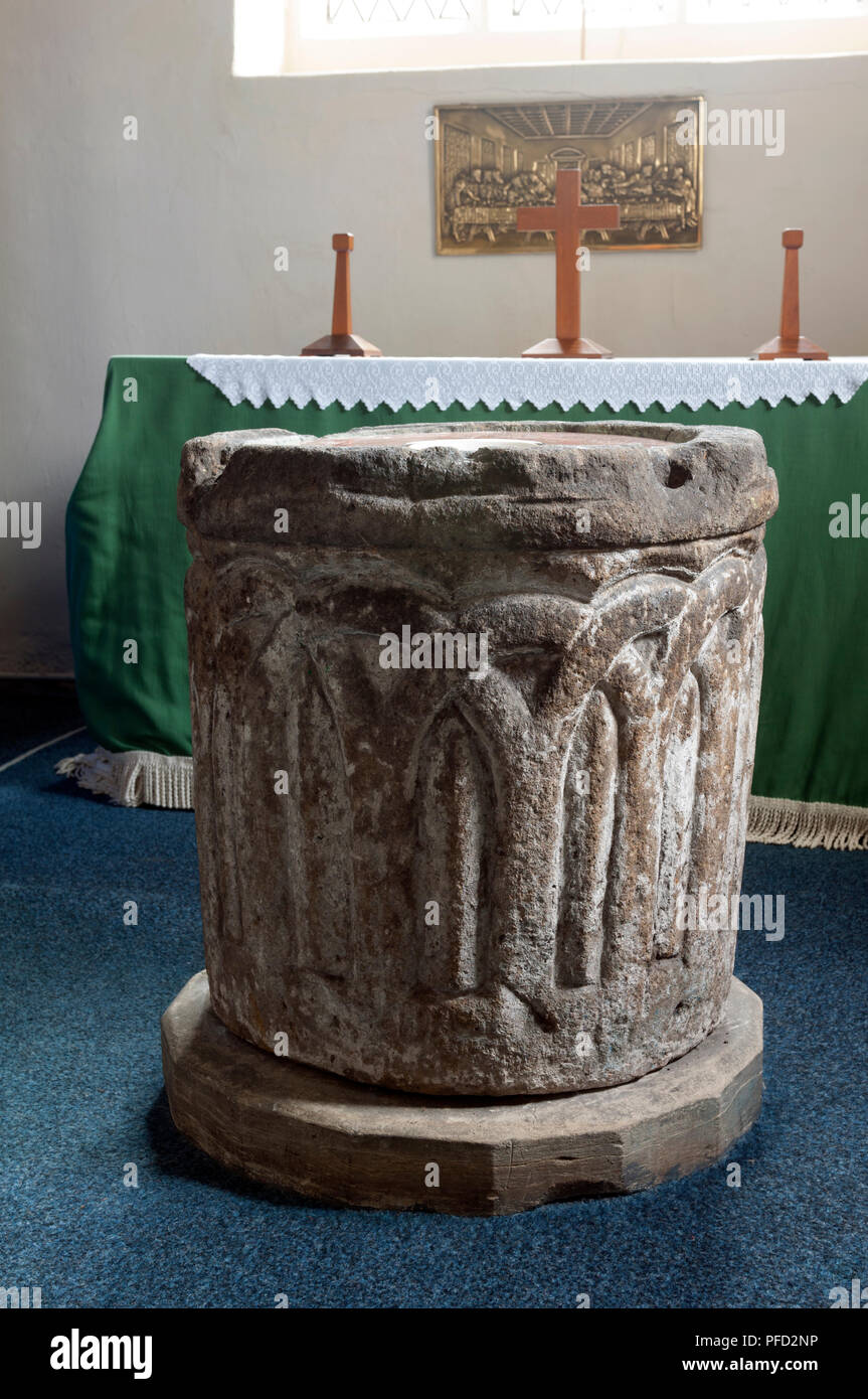 An old font in St. Peter and St. Paul`s Church, Hathern, Leicestershire, England, UK Stock Photo